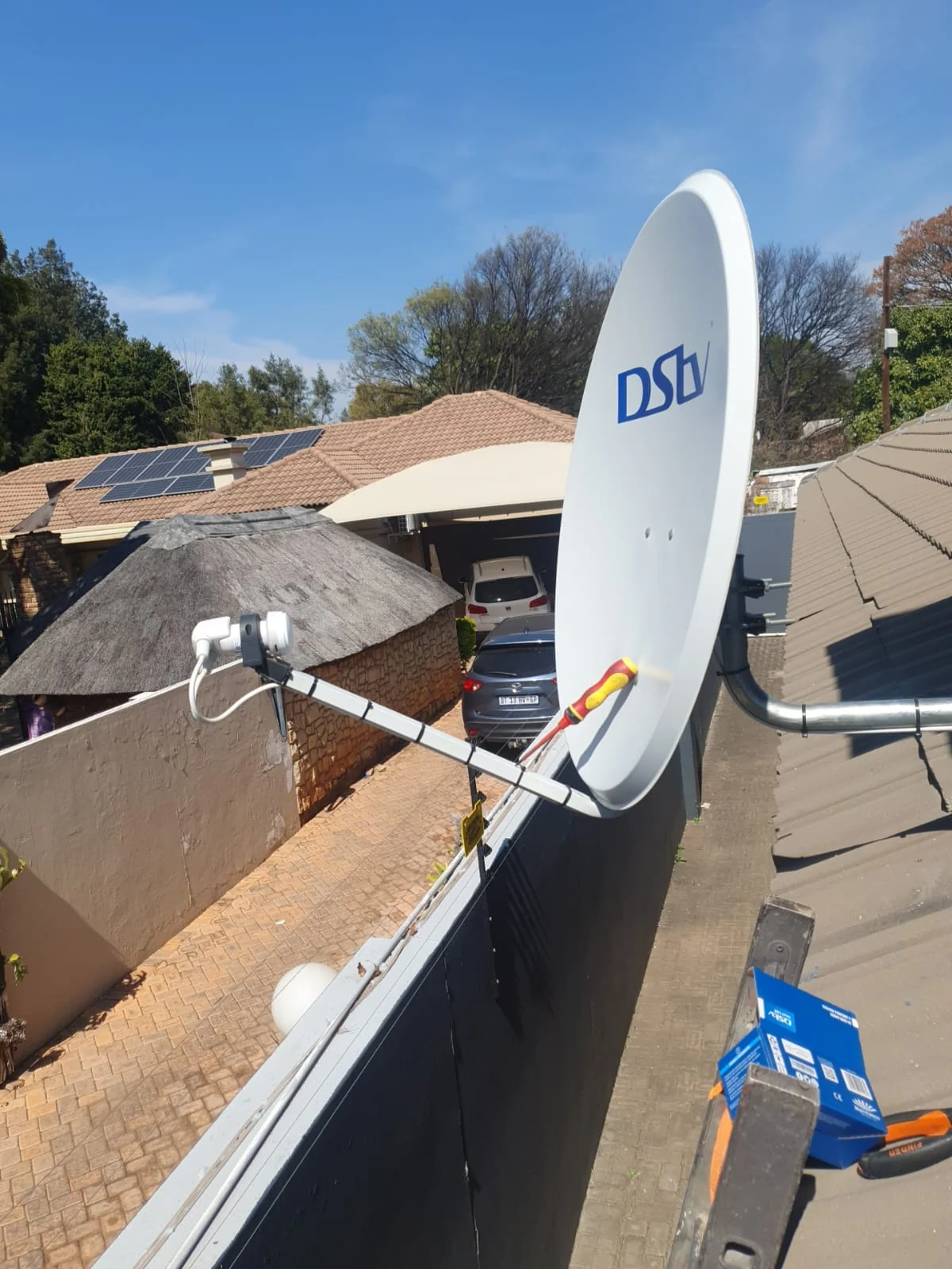 DStv satellite dish with LNB and mounting hardware